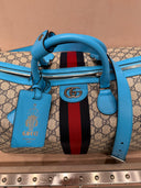 Sac de voyage GG Supreme beige et bleu avec bande Web