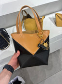 Mini cabas géométrique en cuir bicolore