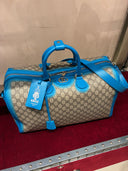 Sac de voyage GG Supreme effet spray bleu électrique