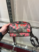 Sac bandoulière monogrammé camouflage rose