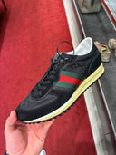 Sneakers rétro monogrammées noires à bande Web