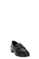 Mocassins à bout recourbé