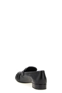 Mocassins à bout recourbé