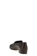 Mocassins à bout recourbé