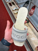 Mules plates logo brodé en toile éponge gris clair