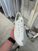 Sneakers basses en cuir blanc et jaune