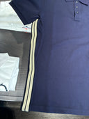 Polo piqué bleu marine à bandes latérales contrastées