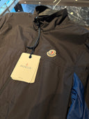 Veste coupe-vent légère bicolore noir et bleu