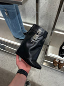 Bottines basses à cadenas en cuir noir