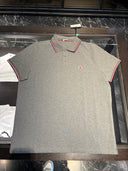 Polo piqué gris chiné à finitions tricolores