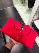 Polo en piqué de coton rouge à finitions contrastées