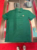 Polo en coton piqué vert sapin à bandes tricolores latérales