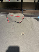 Polo piqué gris chiné à finitions tricolores