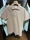 Polo piqué à détail check beige sable