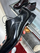 Richelieus en cuir noir à détails métalliques