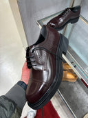 Souliers Derby en cuir à motif GG embossé et semelle commando