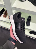 Sneakers techniques en nylon noir et blanc à semelle oversize