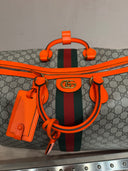 Sac de voyage GG Supreme beige et orange avec bande Web