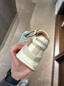 Sneakers épaisses à bride logo et empiècements check beige clair