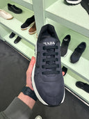 Sneakers techniques bleu en nylon à semelle crantée