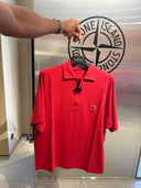 Polo zippé en maille rouge corail