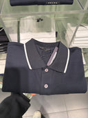 Polo en piqué de coton bleu marine à finitions contrastées