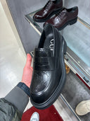 Mocassins plateforme en cuir noir GG embossé
