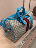 Sac de voyage GG Supreme beige et bleu avec bande Web