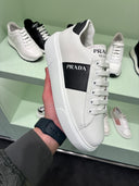 Sneakers plateforme en cuir blanc et noir