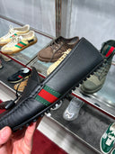 Mocassins en cuir lisse noir avec bande Web