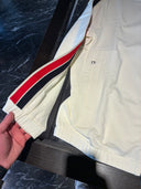 Veste de survêtement écrue à bandes tricolores rouge et bleu marine