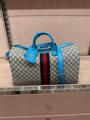 Sac de voyage GG Supreme beige et bleu avec bande Web