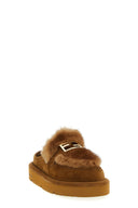 Sabots en daim et fourrure