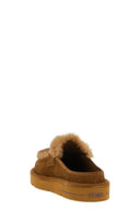 Sabots en daim et fourrure