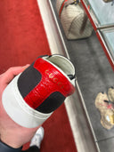 Chaussures sans lacets slip-on noires bande Web bleu et rouge