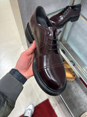 Souliers Derby en cuir à motif GG embossé et semelle commando