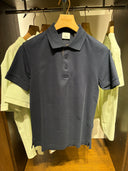 Polo piqué à détail check bleu marine