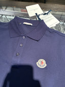 Polo piqué bleu marine à bandes latérales contrastées