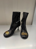 Bottines à talon logo métallique BB en cuir noir