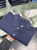 Polo en piqué de coton bleu marine à logo signature