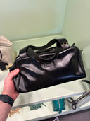 Sac bowling en cuir noir brillant