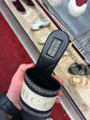 Mules à talon monogrammées en maille beige et noir