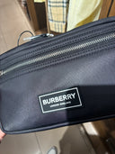 Trousse de toilette en nylon noir avec logo appliqué