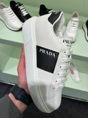 Sneakers plateforme en cuir blanc et noir