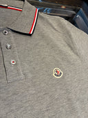 Polo piqué gris chiné à finitions tricolores