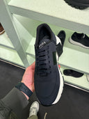 Sneakers techniques bleu en nylon à semelle oversize contrastante