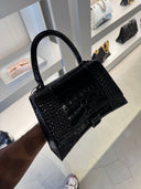 Sac à main Hourglass Top Handle en cuir embossé crocodile noir brillant