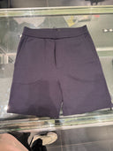 Short en molleton bleu marine avec détail nylon et logo triangle