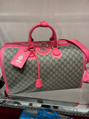 Sac de voyage monogrammé dégradé rose fluo