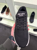 Sneakers techniques en nylon noir et blanc à semelle oversize